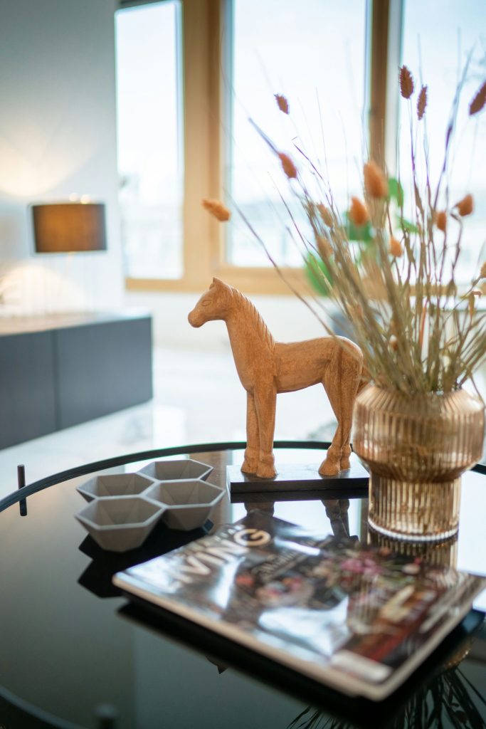 brown deer figurine on table